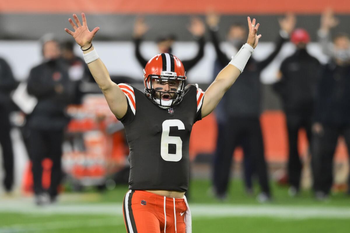 Cleveland Browns quarterback Baker Mayfield celebrates after running back Kareem Hunt scores a touchdown.