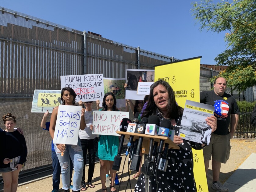 Erika Guervara-Rosas, Americas director at Amnesty International, presents a report titled, "Saving Lives is Not a Crime," during a press release at San Ysidro on Tuesday July 2, 2019. The report alleges a campaign of harassment targeting human rights workers along the U.S.-Mexico border.