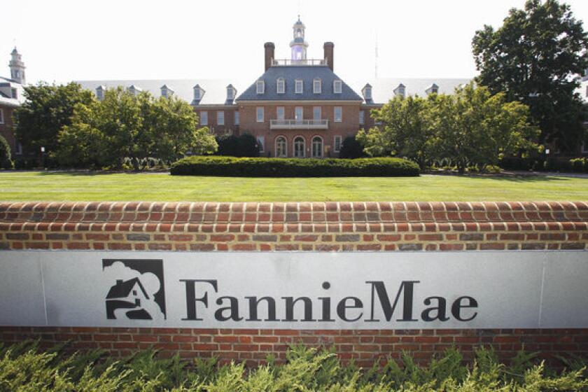 The agency that regulates Fannie Mae and Freddie Mac is considering reducing the maximum size of home loans that the mortgage giants can acquire. Above, Fannie Mae's headquarters in Washington.
