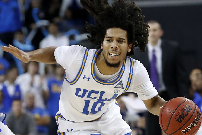 Bruins guard Tyger Campbell brings the ball upcourt against Hofstra on Nov. 21, 2019, at Pauley Pavilion.