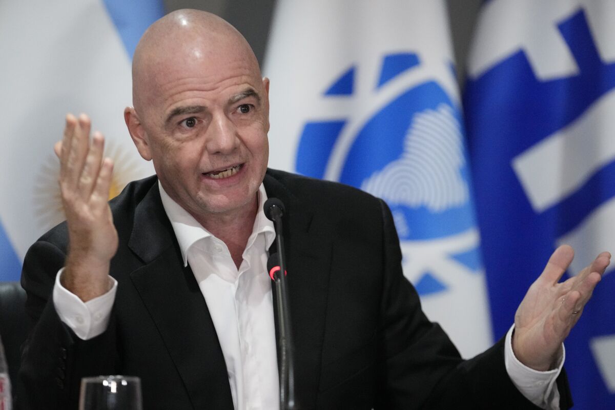 FIFA President Gianni Infantino speaks during a joint press conference with CONMEBOL President Alejandro Dominguez at CONMEBOL headquarters in Luque, Paraguay, Thursday, March 30, 2023. (AP Photo/Jorge Saenz)
