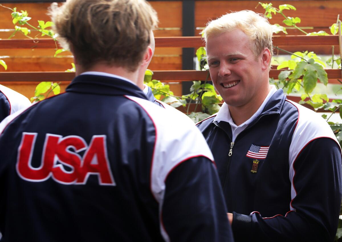 Huntington Beach High School graduate Chase Dodd smiles as his younger brother Ryder Dodd is announced on Tuesday.