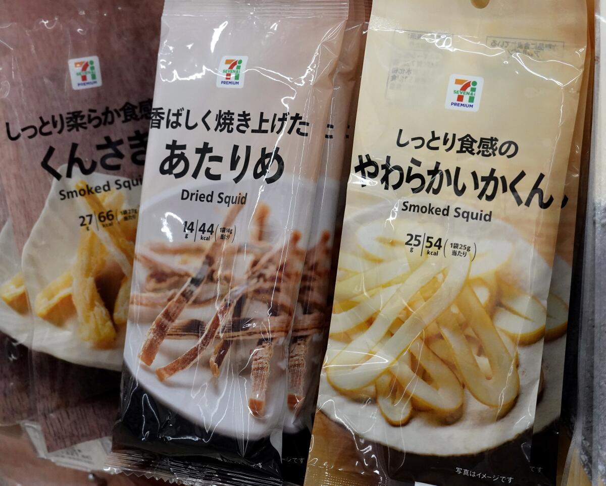Packages are labeled "Smoked Squid" and "Dried Squid"