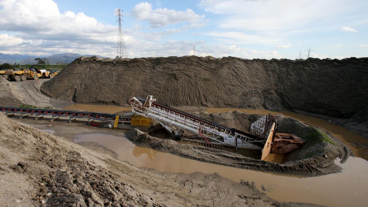 The Tujunga Spreading Grounds in Sun Valley, shown under construction in 2017, are designed to capture water released from nearby dams that then seeps through porous soil into the aquifer. A parcel tax being considered in L.A. County could fund similar projects.