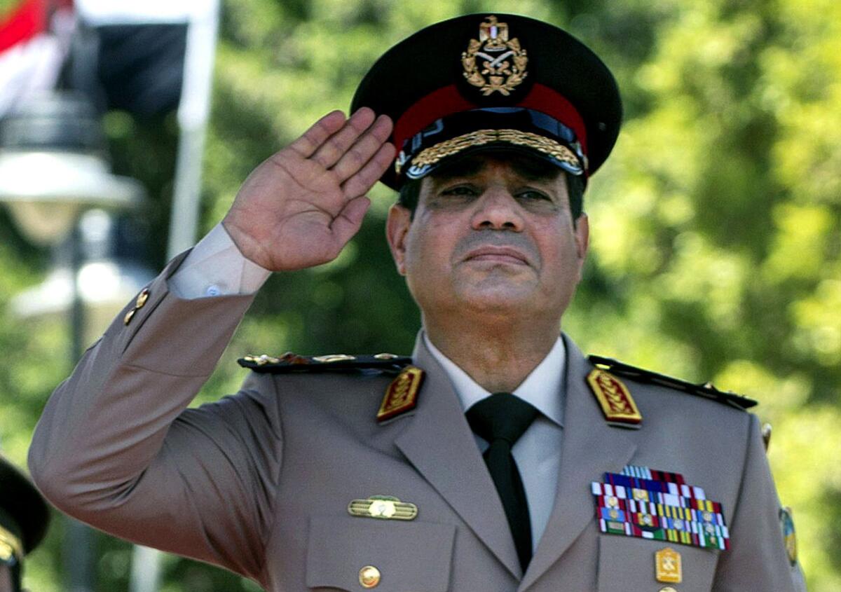 Field Marshal Abdel-Fattah Sisi, shown last April during an arrival ceremony in Cairo for U.S. Secretary of Defense Chuck Hagel, is widely expected to run for Egypt's presidency.