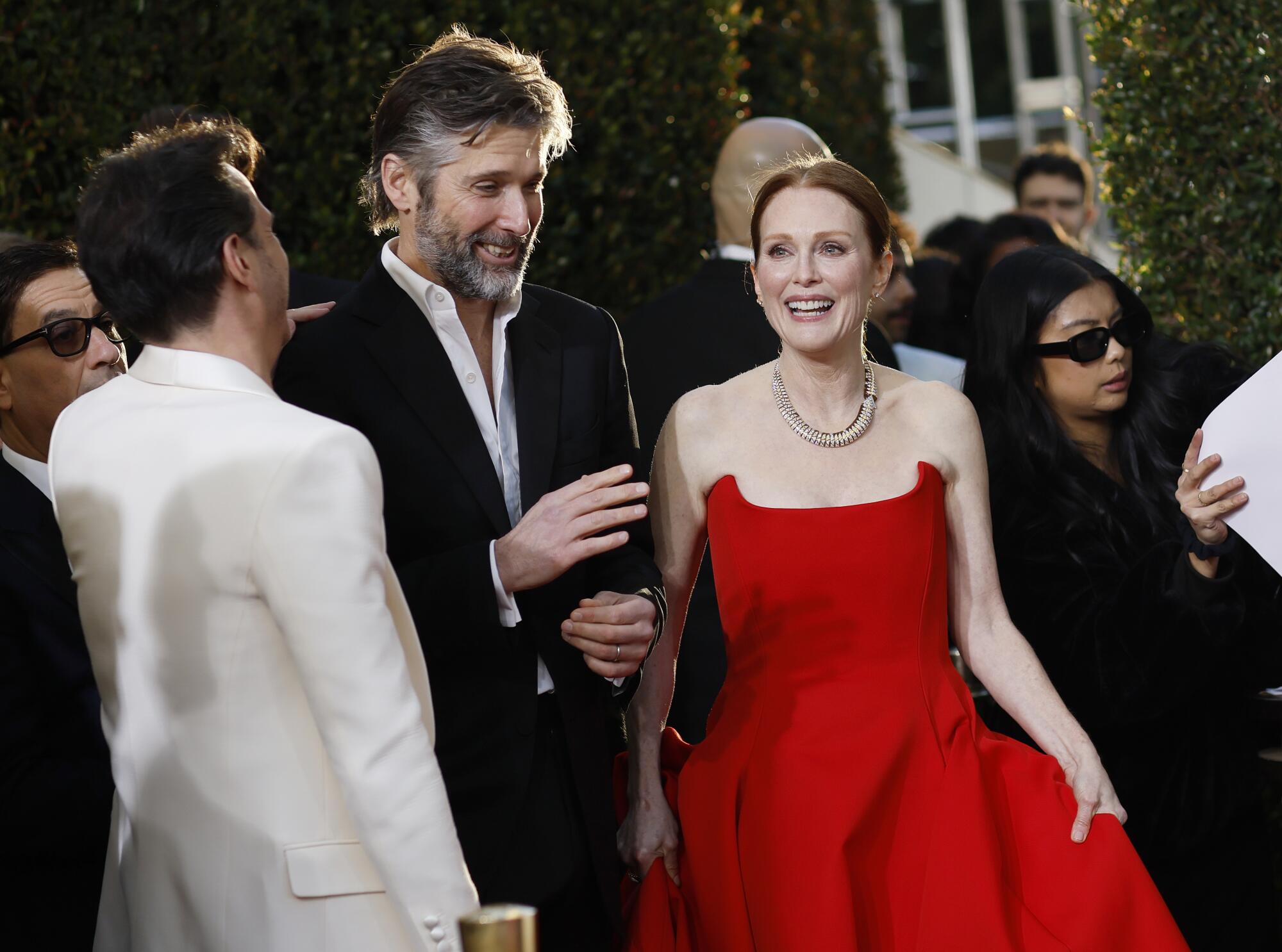 Bart Freundlich and Julianne Moore on the red carpet of the 81st Annual Golden Globe Awards