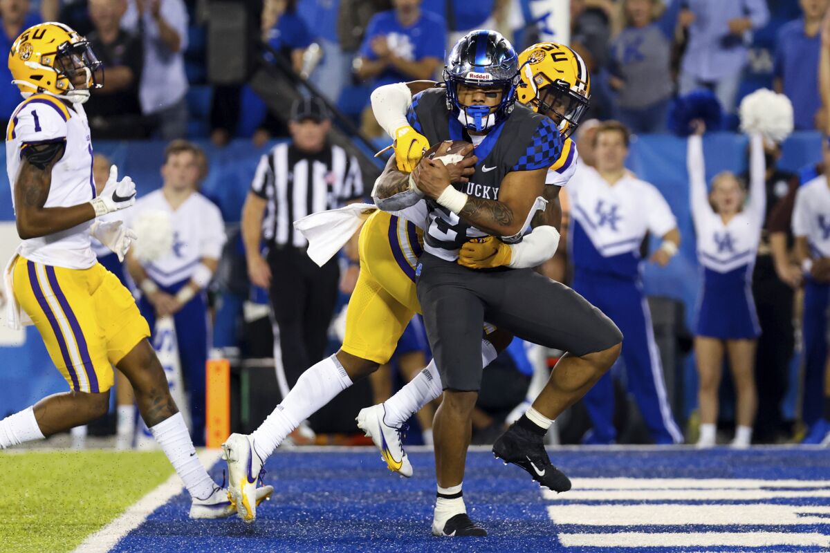 Kentucky running back Chris Rodriguez Jr. (24) runs the ball into the end zone for a touchdown during the second half against LSU in an NCAA college football game in Lexington, Ky., Saturday, Oct. 9, 2021. (AP Photo/Michael Clubb)
