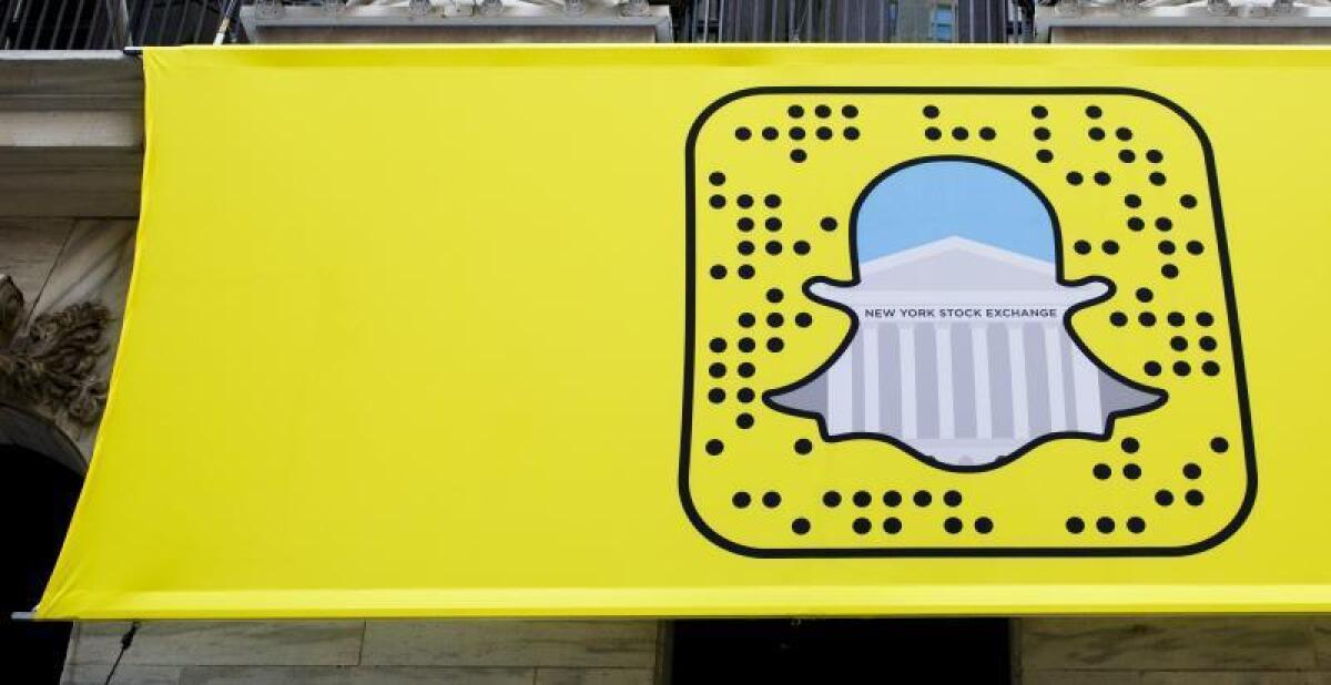 A logo for Snapchat hangs on the front of the New York Stock Exchange in New York, New York, USA. EPA/Justin Lane/File