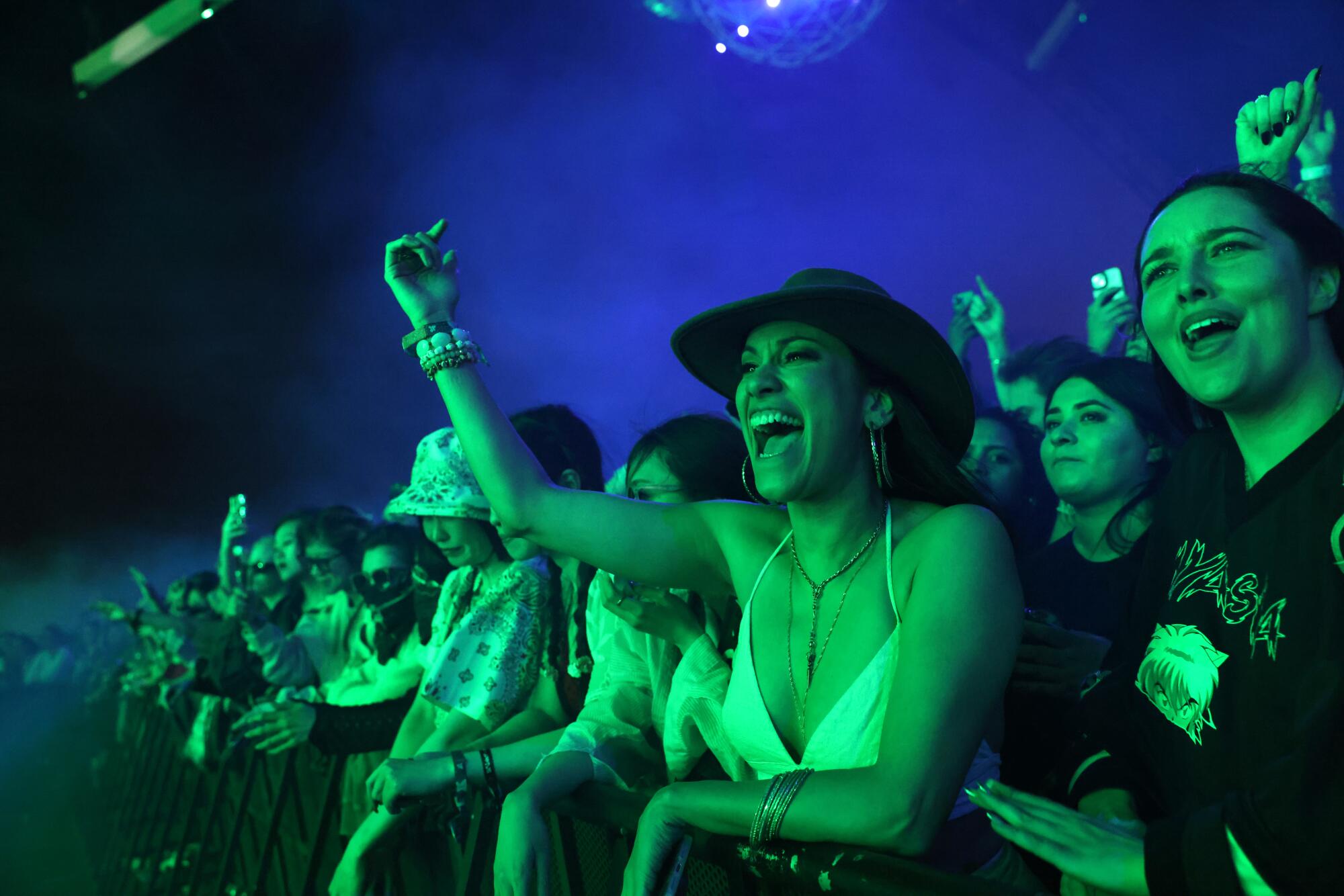 Fans watch Bizarrap perform at Coachella on Friday.