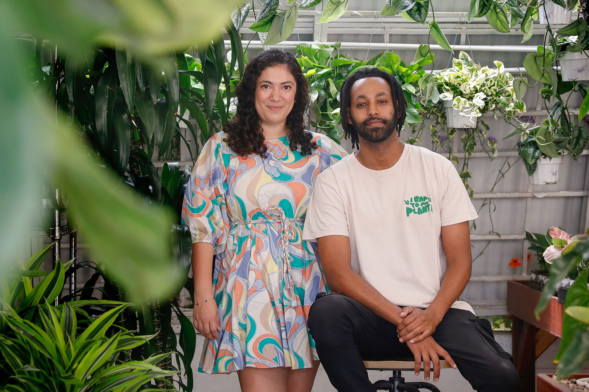 Sandra Mejia, left, and her husband, Bantalem Adis, inside Plant Chica, which they opened in 2021.