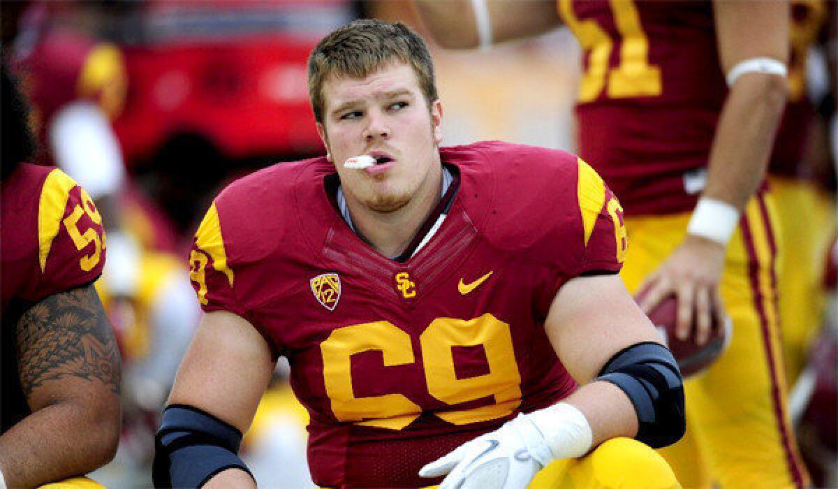 Cyrus Hobbi was thrust into the starting center position for USC last season against Stanford when senior Khaled Holmes went down with injury. The Trojans line was unable to protect quarterback Matt Barkley and fans directed their anger at Hobbi, who turned that experience into a 15-minute dramatic solo performance.