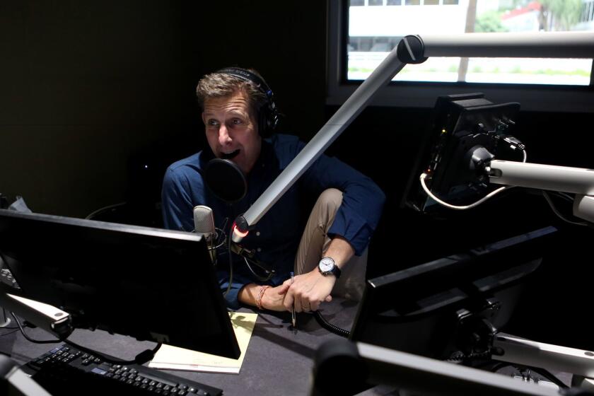 LOS ANGELES, CALIFORNIA: March 21, 2017 - Kai Ryssdal, host and senior editor of the program Marketplace, prepares to record an episode of his "Make Me Smart" podcast. (Katie Falkenberg / Los Angeles Times)
