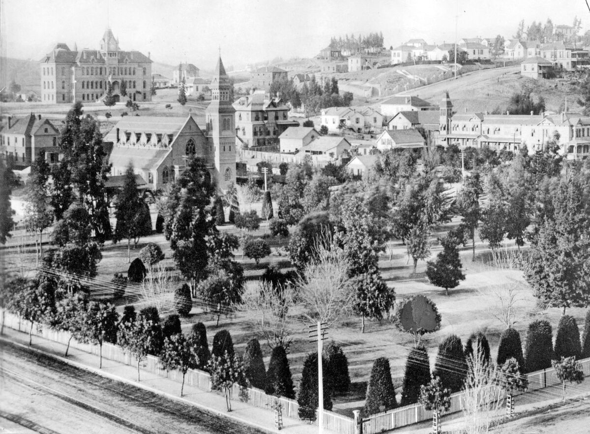 One of Los Angeles' oldest public spaces, Pershing Square, then known as Central Park, is shown in 1885. The view is northwest from Sixth and Hill streets with the old Normal School building in the background left. In the left center is St. Paul's Church, which was torn down to make way for the Biltmore Hotel.