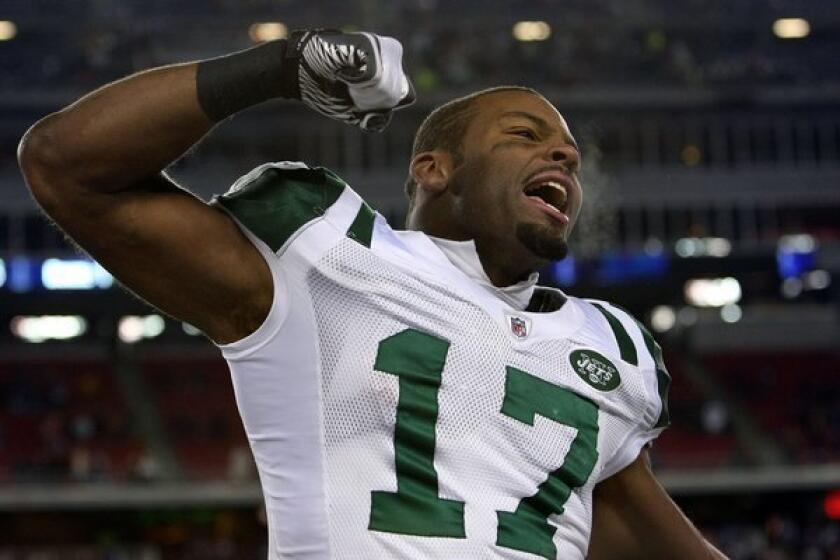 Braylon Edwards, shown in 2011, has been reunited with the New York Jets, a team he said was run by "idiots" just last week. He subsequently apologized.