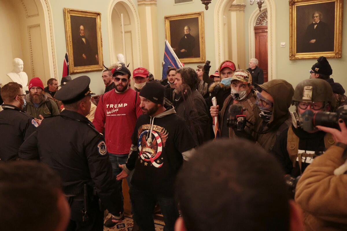 Trump supporters confront police in U.S. Capitol 