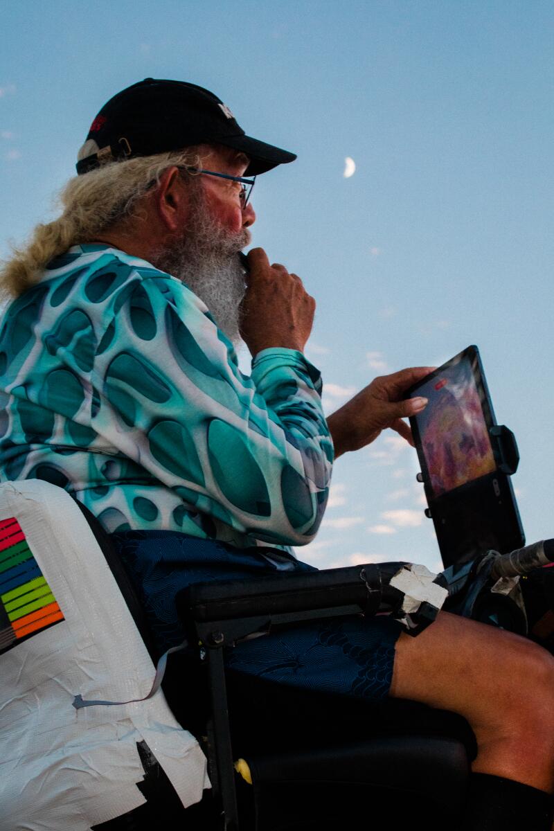 LAS VEGAS, NV - AUGUST 23: A man videos The Sphere in Las Vegas, Nevada on August 22, 2023. (Sinna Nasseri / For The Times)