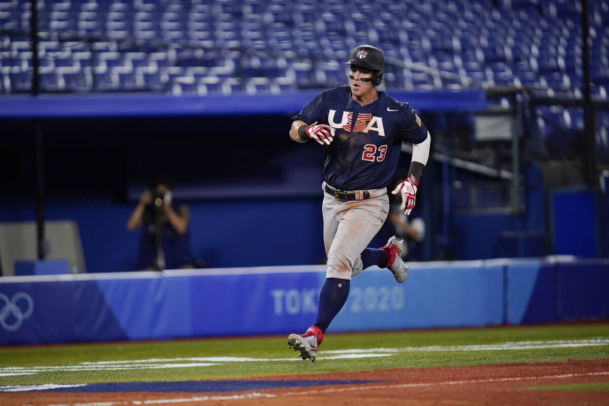 Tyler Austin runs home during an Olympic game against Israel.