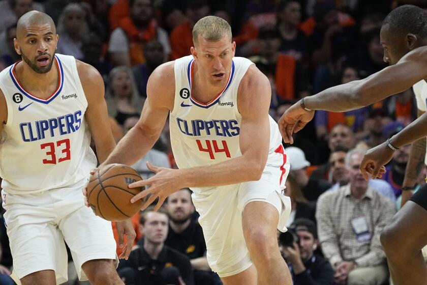 Los Angeles Clippers center Mason Plumlee (44) moves the ball up court against the Phoenix Suns.