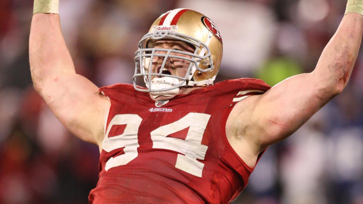 San Francisco 49ers defensive end Justin Smith celebrates a sack during an NFC Championship win over the New York Giants on Jan. 22, 2012.