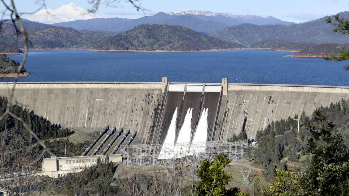 Water flows from the gates of the Shasta Dam on Jan. 12, 2017.