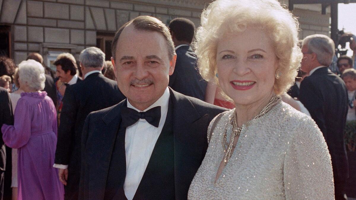 John Hillerman with Betty White at the Emmy Awards in Pasadena in 1985.