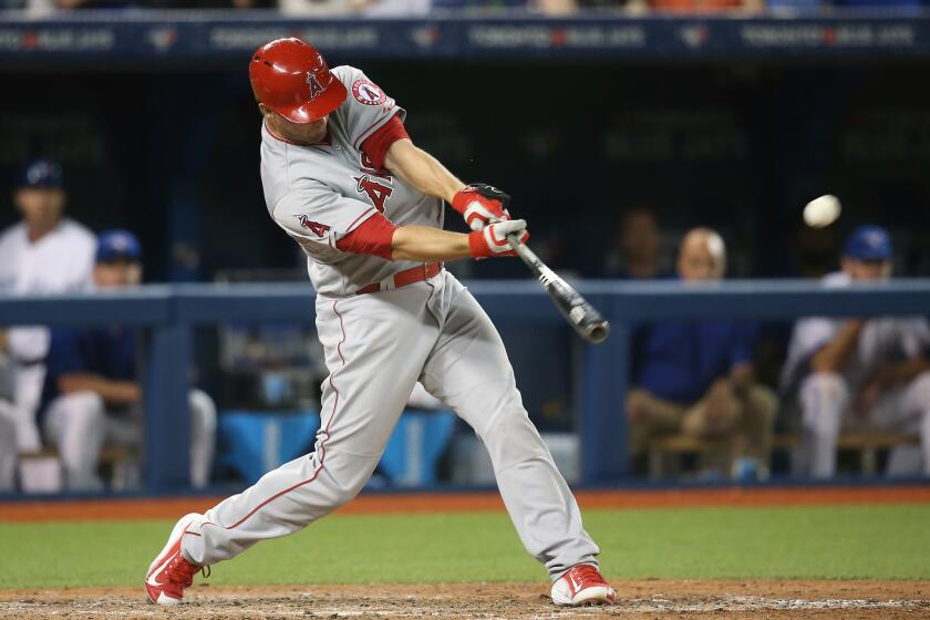 Angels third baseman David Freese hits a sacrifice fly to drive in the eventual game-winning run in the eighth inning of a game against the Toronto Blue Jays on May 19.
