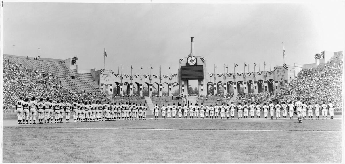 Baseball players lined up in L.A. Memorial Coliseum