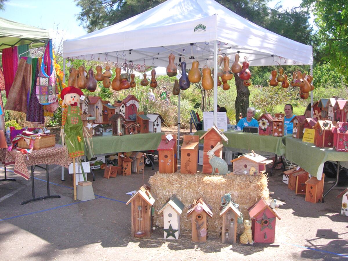 Whimsical birdhouses designed and crafted by Master Gardeners will be for sale, made of wood or carved from gourds.