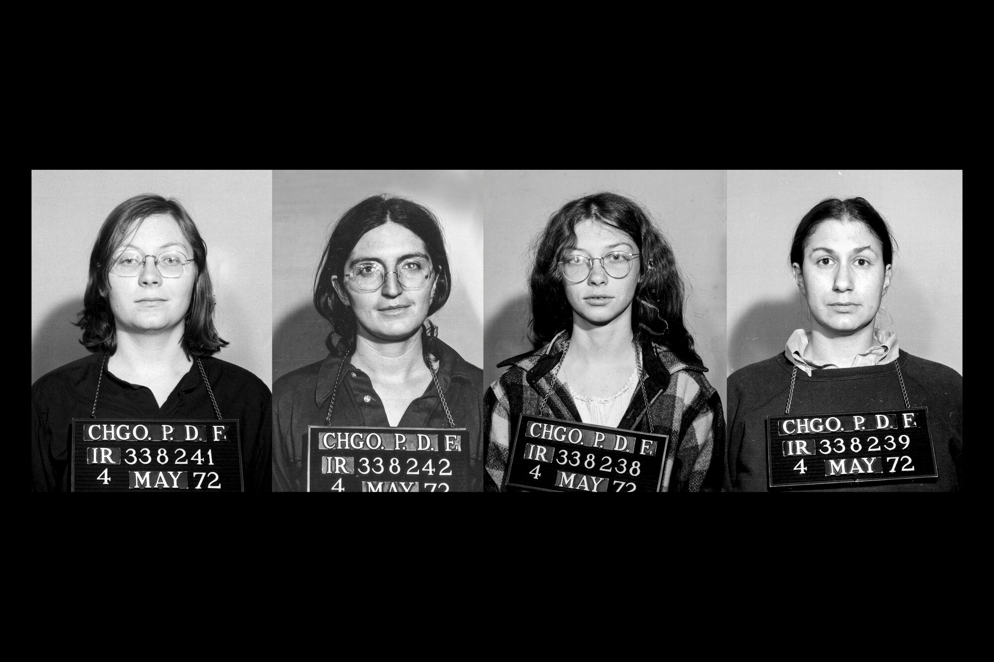 Four black-and-white mugshots of women.