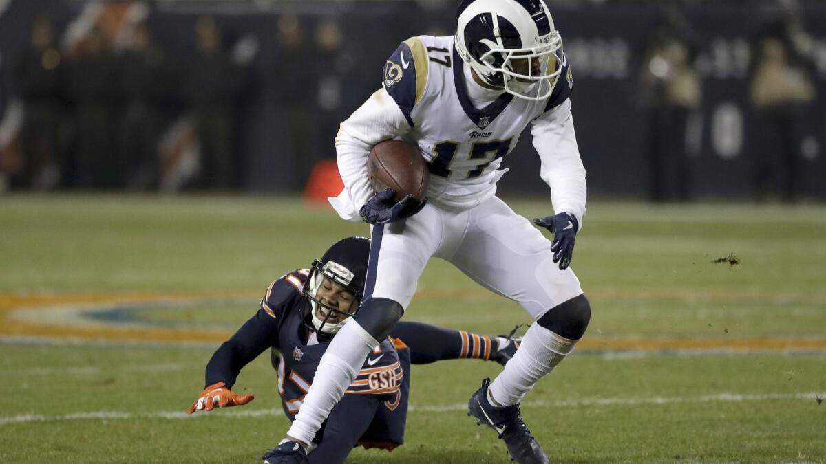 Rams receiver Robert Woods gets past Bears cornerback Bryce Callahan after a reception during the first half Sunday. Woods caught seven passes for a team-high 61 yards.