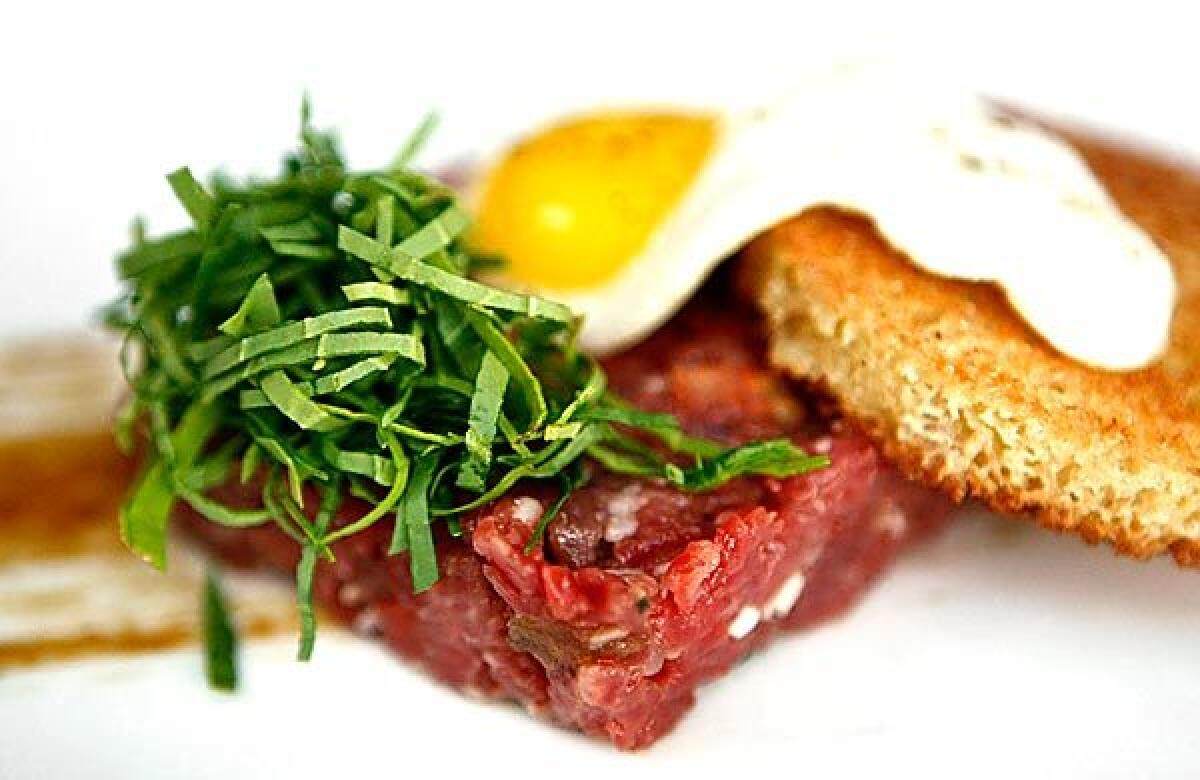 Beef tartare with egg.