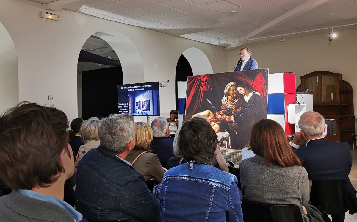 Art auctioneer Marc Labarbe, shown at his Toulouse studio, explains the history of the painting attributed to Caravaggio.