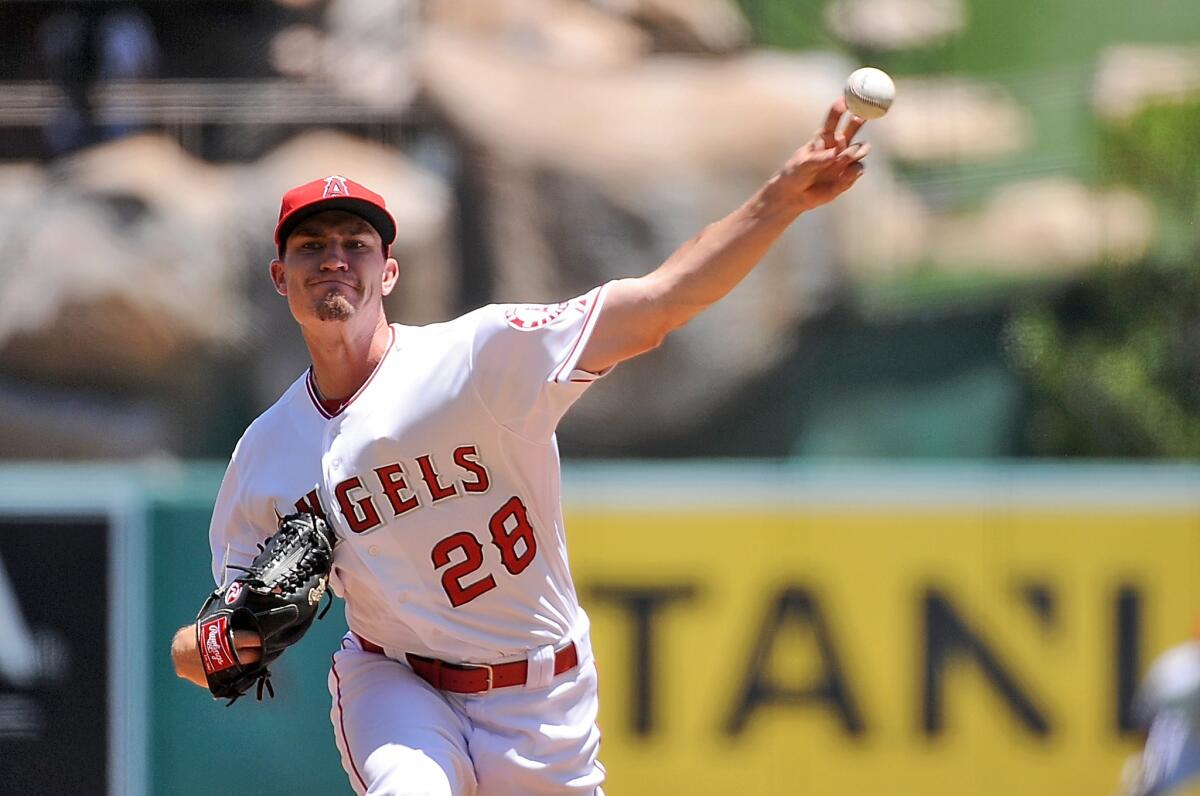 Angels starter Andrew Heaney improved to 5-0 this season by pitching six innings against the Rangers during a 13-7 victory Sunday.