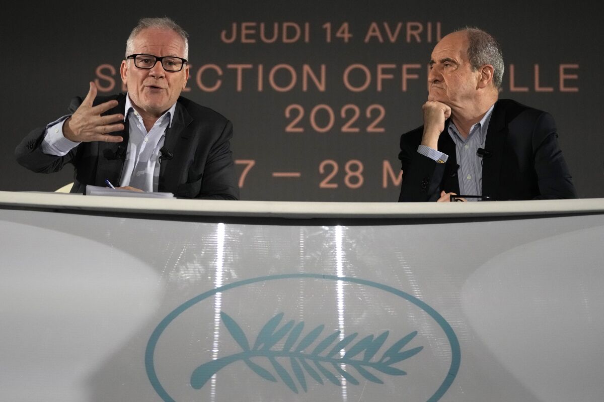 Festival delegate general Thierry Fremaux, left, and festival president Pierre Lescure attend a press conference to announce the Cannes film festival line up for the upcoming 75th edition, Thursday, April 14, 2022 in Paris. The International Cannes Film Festival will run from May 17 to 28, 2022. (AP Photo/Francois Mori)