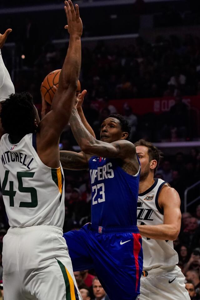 Clippers guard Lou Williams drives to the basket.