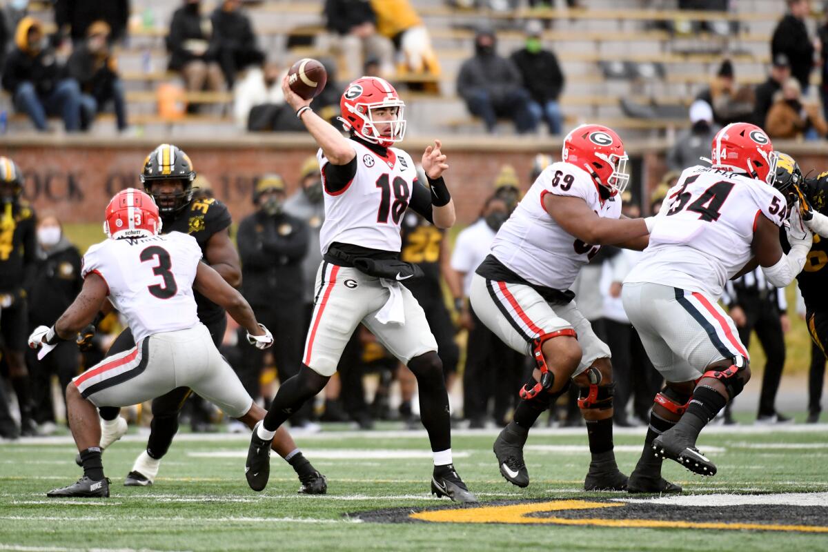 Georgia quarterback JT Daniels throws against Missouri on Saturday.