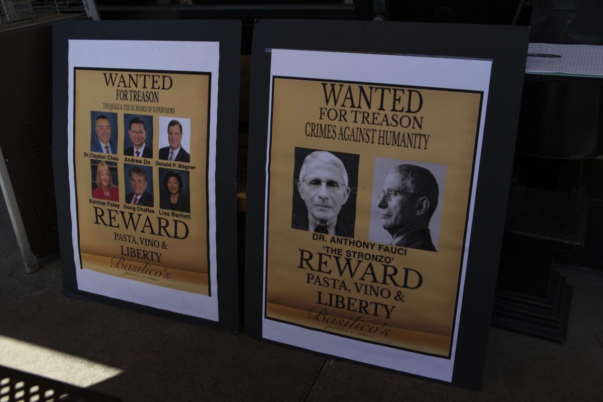 "Wanted" posters appear at Basilico's.