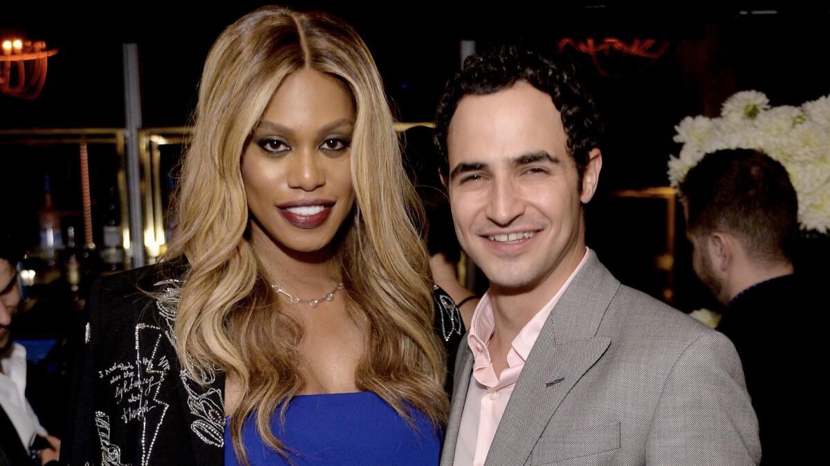 Laverne Cox and Zac Posen attend Entertainment Weekly's pre-Emmy party in Los Angeles on Sept 16.