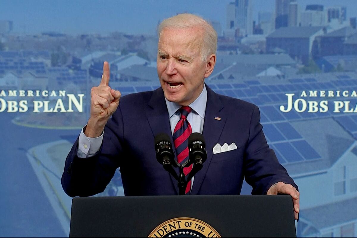 President Biden gestures during a speech on his infrastructure plan.