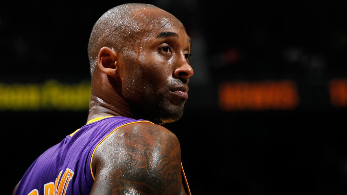 Lakers guard Kobe Bryant looks on during a game against the Atlanta Hawks in December.