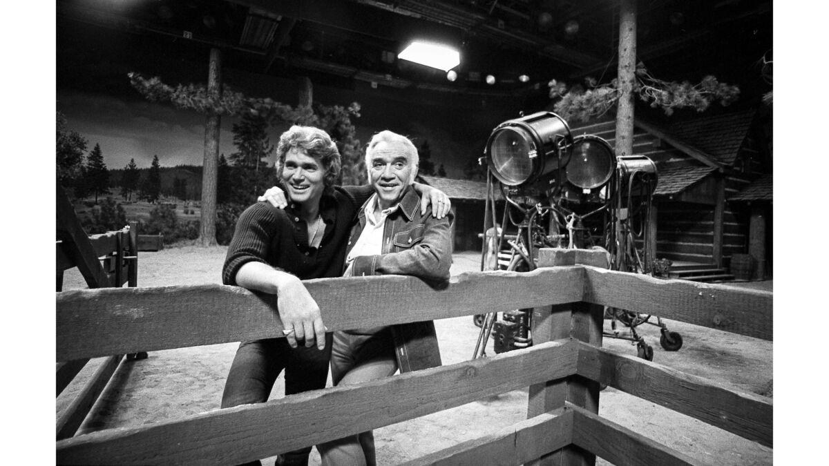 November, 1972: Costars Michael Landon, left, and Lorne Greene on the Bonanza set following the show's cancellation.