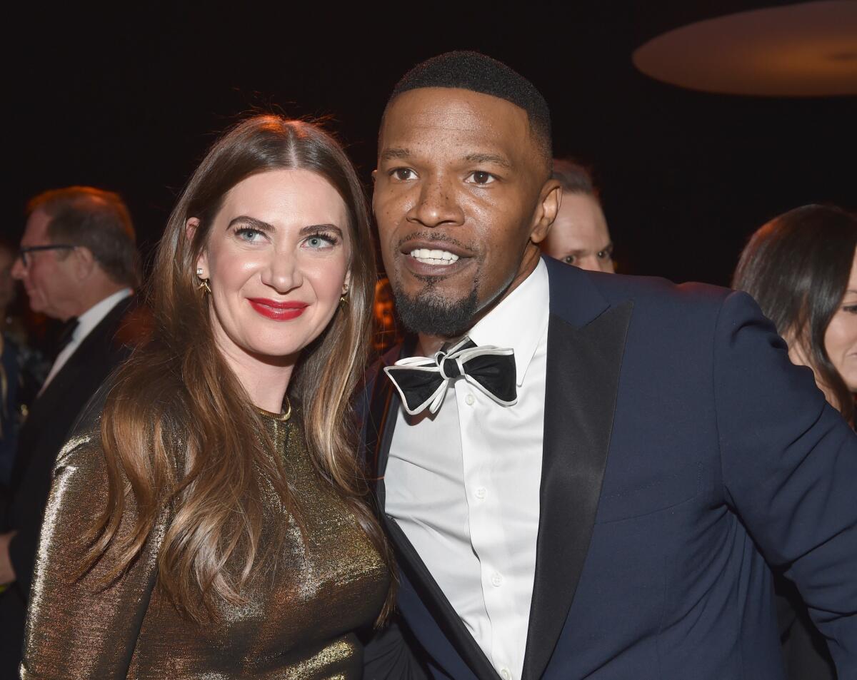 Rochelle Gores Fredston, Learning Lab Ventures founder and executive director, left, and actor Jamie Foxx attend the nonprofit organization's winter gala in Beverly Hills in partnership with Net-a-Porter.