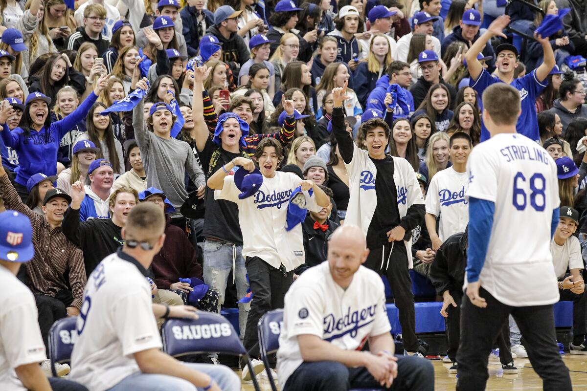 Saugus High students give a warm welcome to pitcher Ross Stripling and other Dodgers players during a pep rally at the Santa Clarita school on Friday.