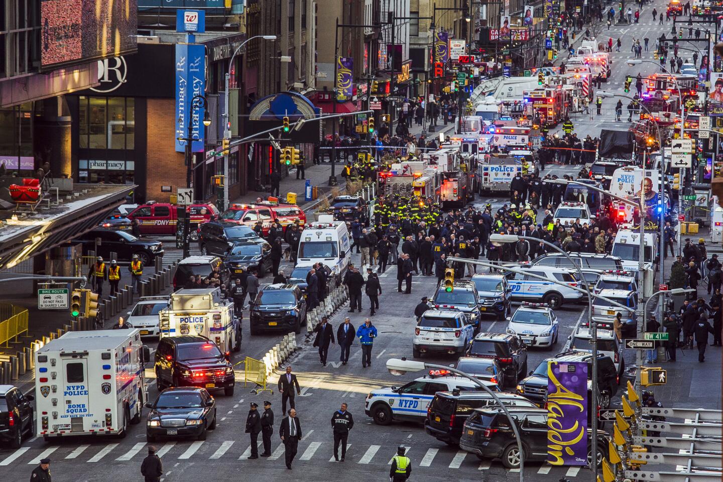 Law enforcement officials work following an explosion near New York's Times Square on Dec. 11, 2017.