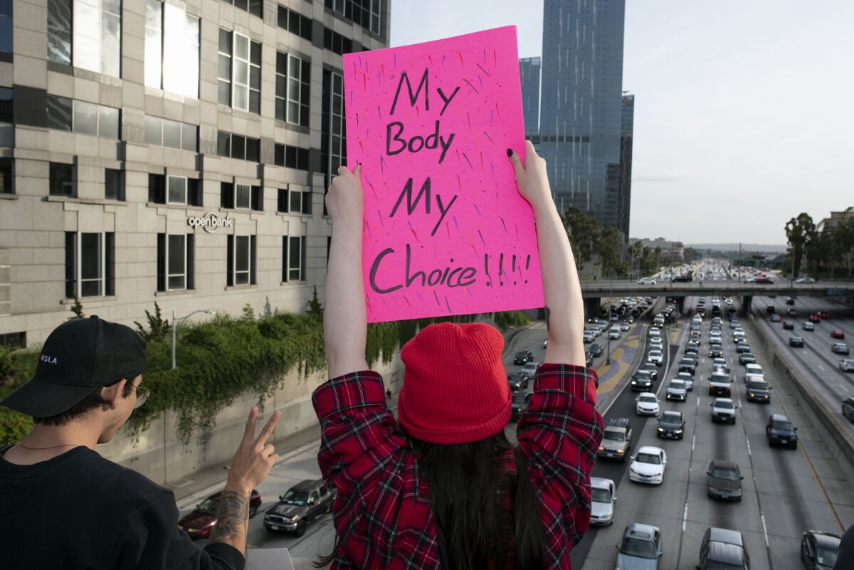 Activists protest restrictions on abortions on May 21, 2019, in Los Angeles. 