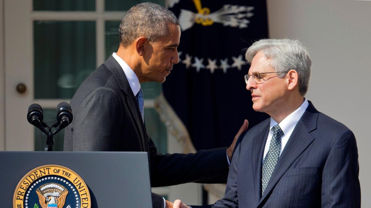 Federal appeals court judge Merrick Garland shakes hands with President Obama as he is introduced as Obama's nominee for the Supreme Court on March 16.