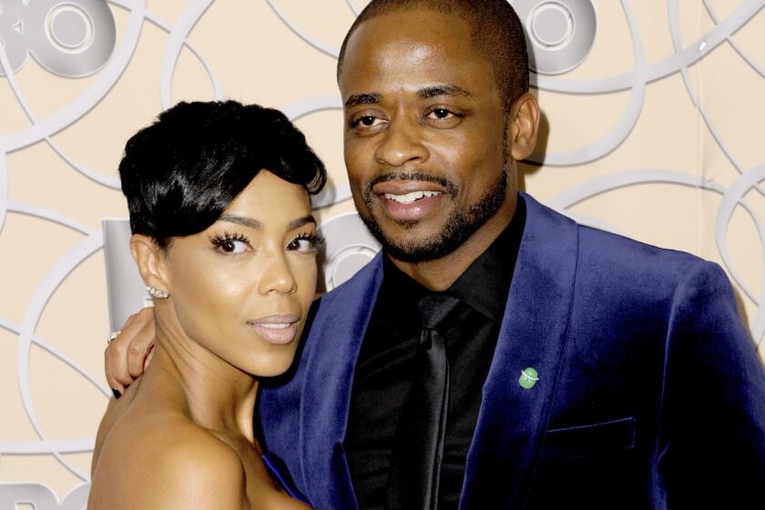 Actors Jazmyn Simon, left, and husband Dule Hill arrive at an awards after party