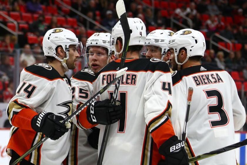 DETROIT, MI - FEBRUARY 13: Adam Henrique #14 of the Anaheim Ducks celebrates his this period goal with teammates while playing the Detroit Red Wings at Little Caesars Arena on February 13, 2018 in Detroit, Michigan. Detroit won the game 2-1. (Photo by Gregory Shamus/Getty Images) ** OUTS - ELSENT, FPG, CM - OUTS * NM, PH, VA if sourced by CT, LA or MoD **
