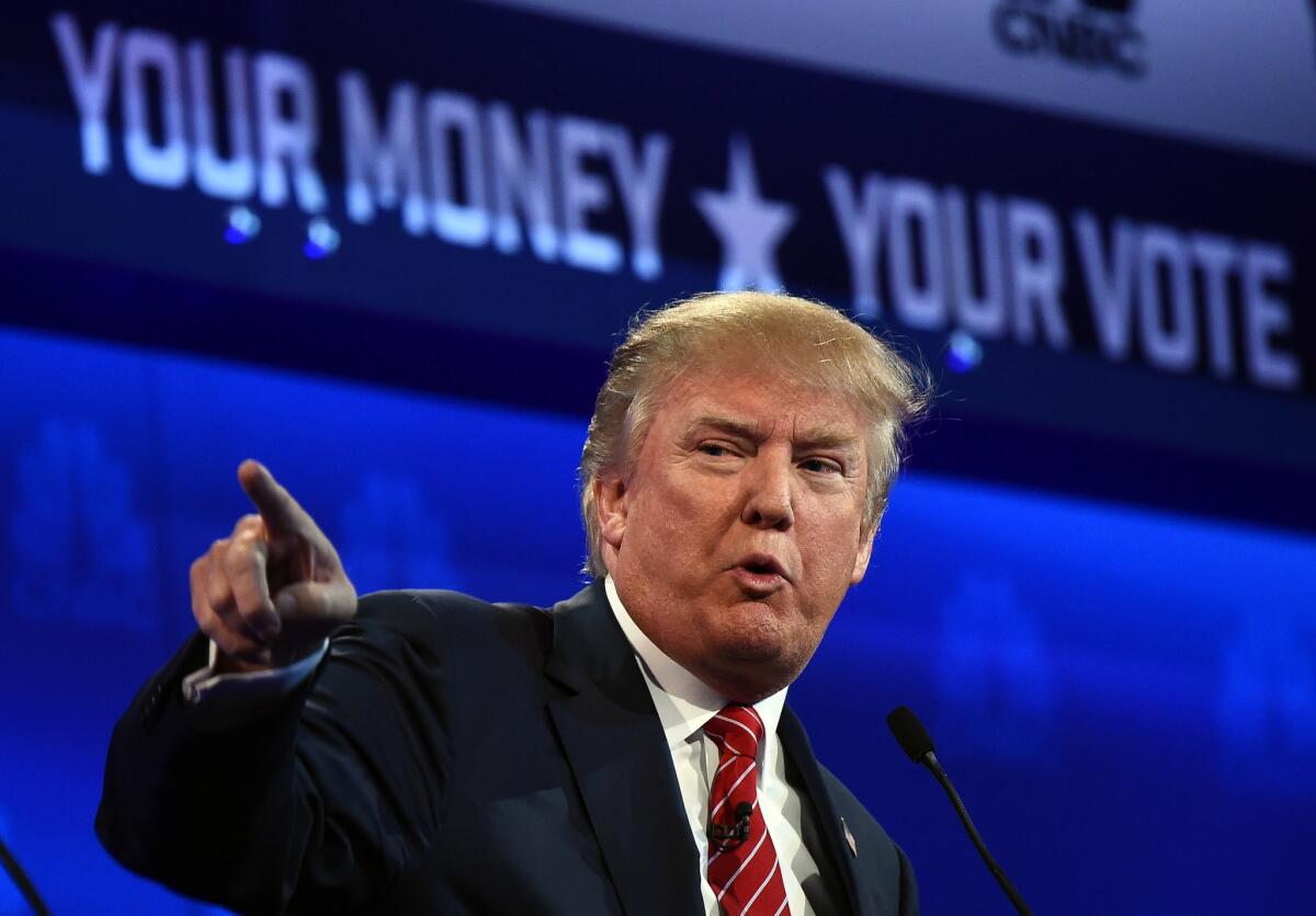 Republican Presidential hopeful Donald Trump speaks during the CNBC Republican Presidential Debate at the Coors Event Center at the University of Colorado in Boulder, Colo.