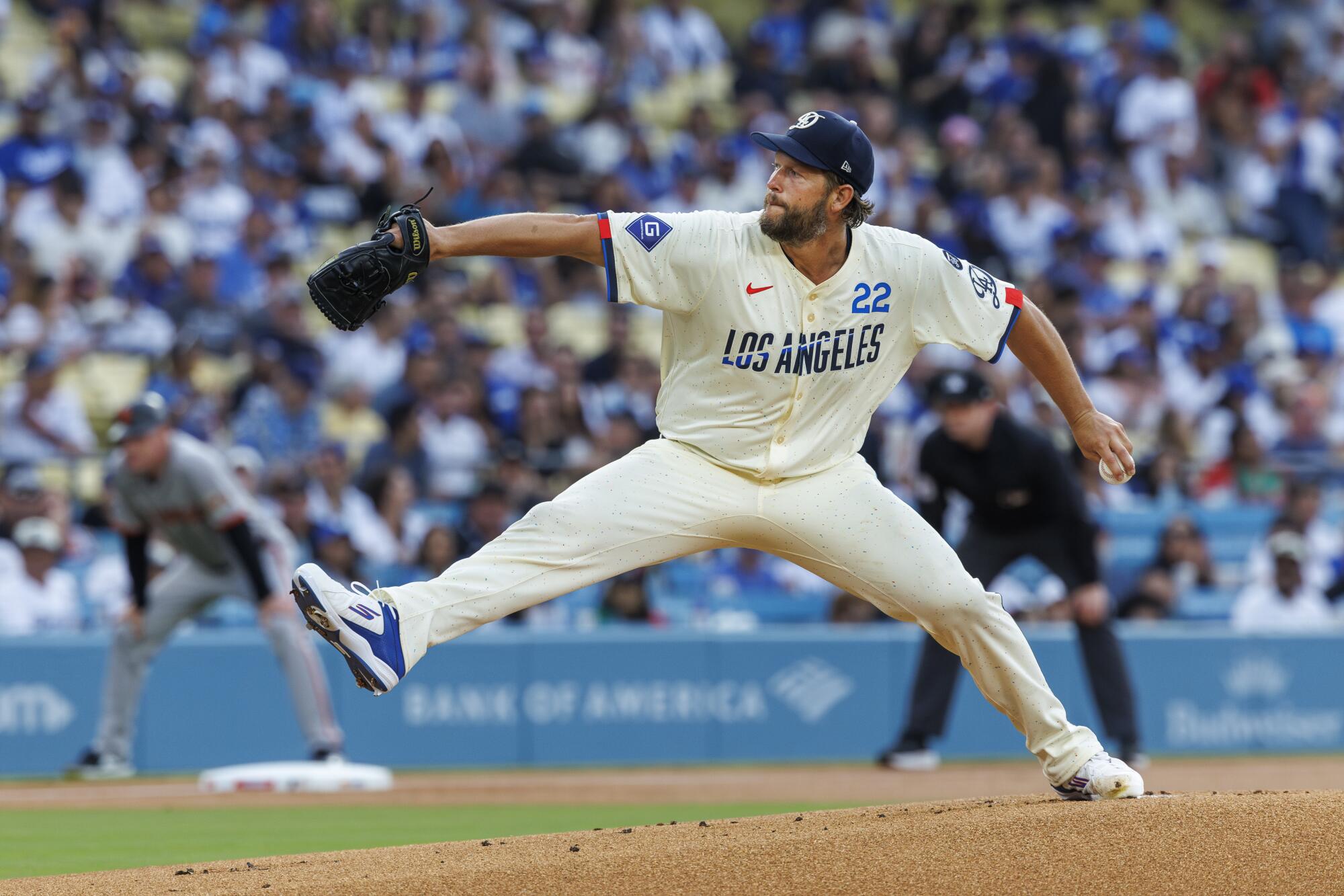 Dodgers pitcher Clayton Kershaw delivers during an 11-5 win over the San Francisco Giants.